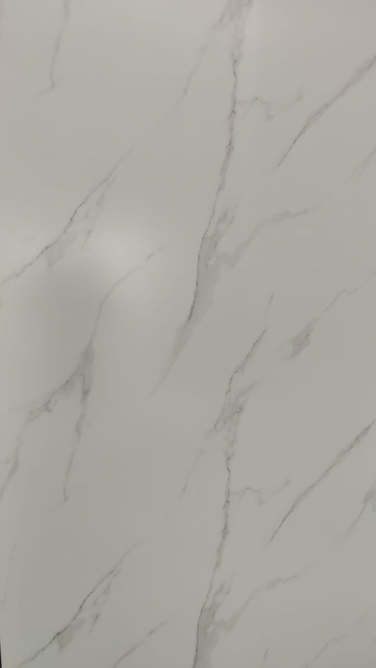 Luxury Carrara Silk white and grey marble effect wall panel in a bright Tenerife bathroom.