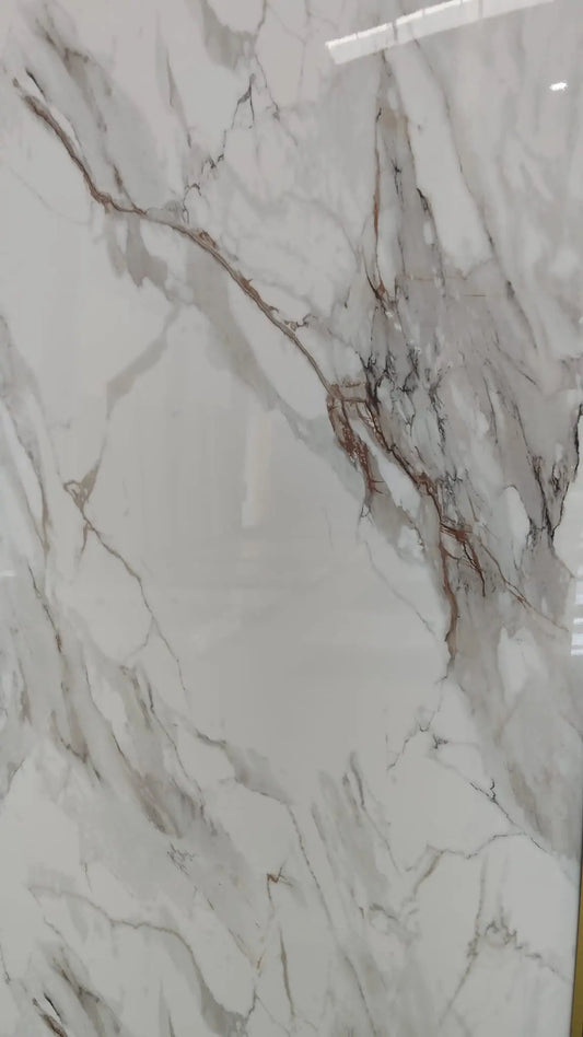 Luxury Elysian Line wall panel with soft bronze veining in a light-filled Tenerife bedroom.