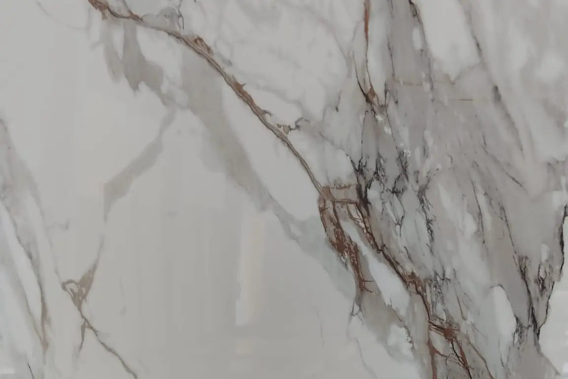 Close-up detail of the delicate light grey and warm bronze veins on the Elysian Line panel.

